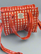 Red cross over bag