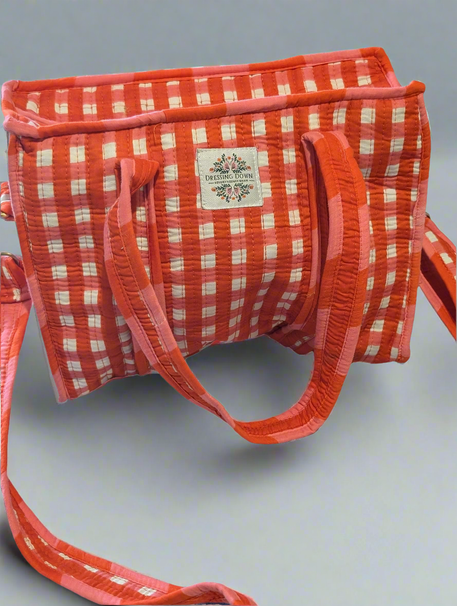 Red cross over bag