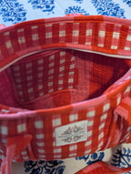 Red cross over bag